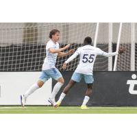 David Poreba (left) celebrates his goal with Chicago Fire FC II teammate Omari Glasgow